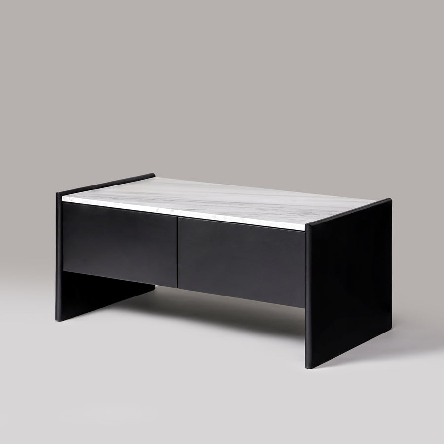 Ares black matte coffee table with natural white marble top, angled view
