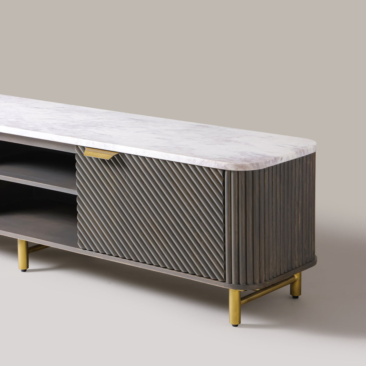 Kelby Mist Grey TV unit showing hand-finished fluted door and gold-finish handle