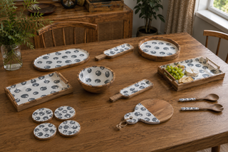 Clam mango wood serveware set styled on a table