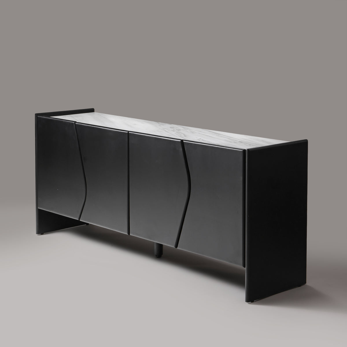 Ares black matte sideboard with natural white marble top, angled view