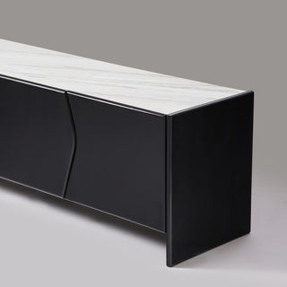 Close-up of wave-cut wood door join on Ares TV unit