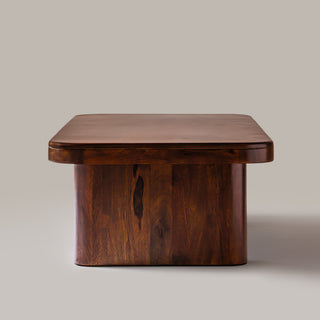 Cinder coffee table end view, showing a slab leg