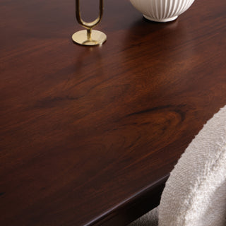 Close-up of Cinder dining table rounded corner and mango wood grain