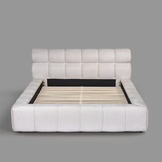 Marshmallow Cloud Bed - front view with tufted headboard and slatted base