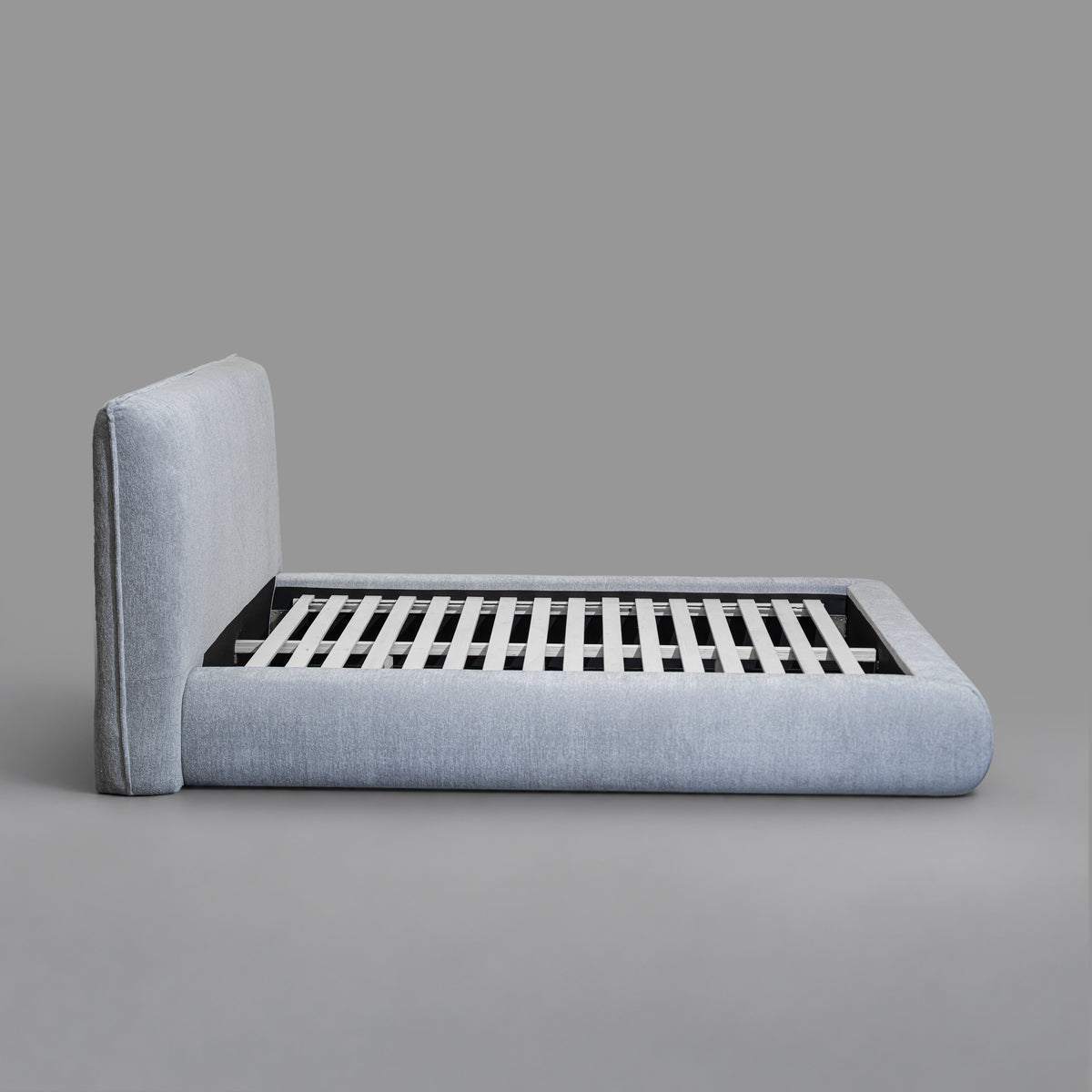 Haze Bed - side view with slatted base