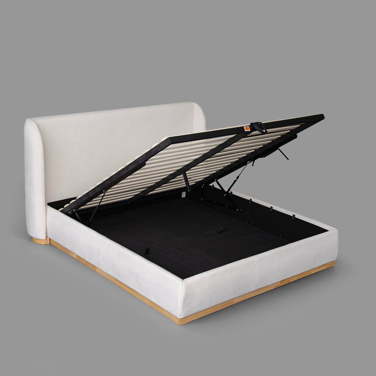 Storage space under the bed with the base lifted open