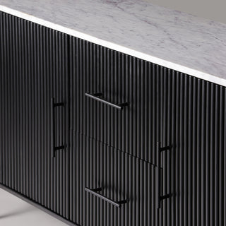 Close-up of the Kelby black buffet reeded front, handles and marble top
