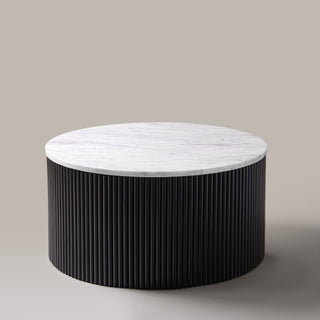 Kelby round natural marble coffee table with black reeded base
