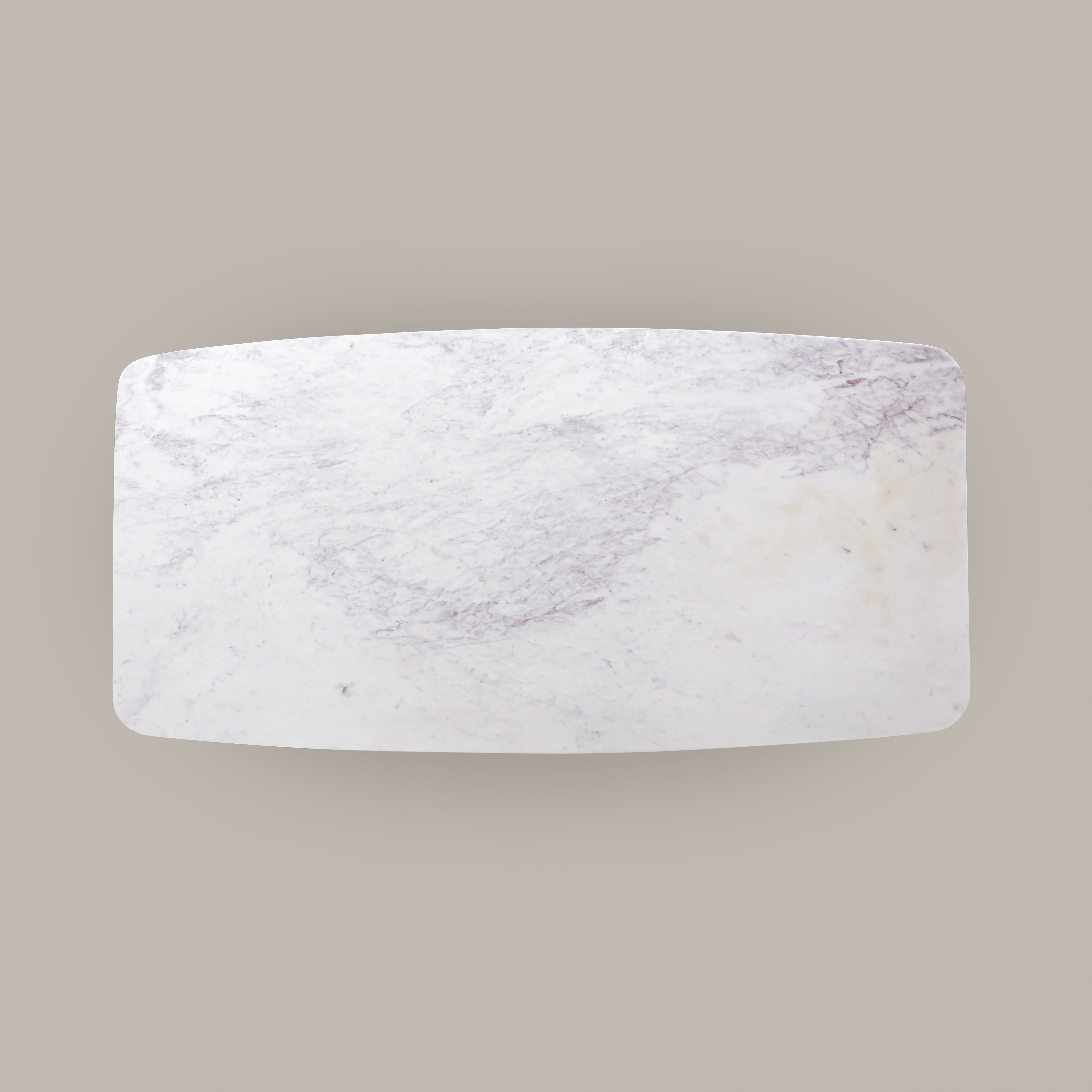 Natural marble top of the Kelby dining table from above