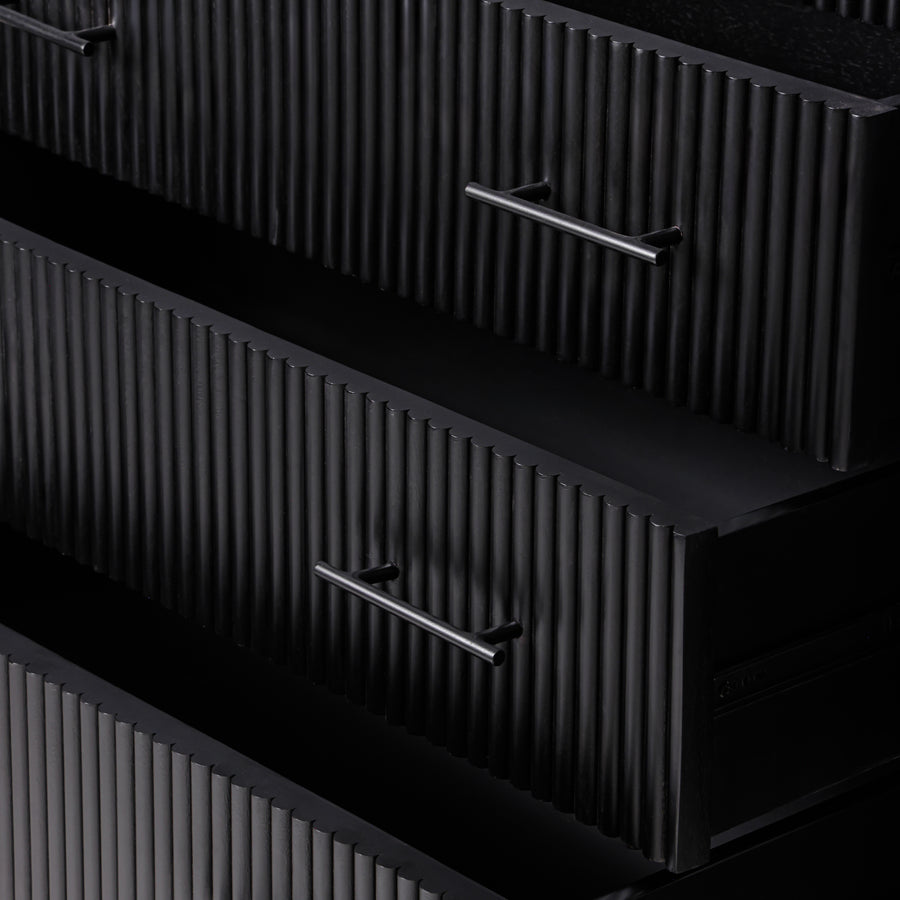 Close-up of the Kelby tallboy reeded drawer fronts and handles