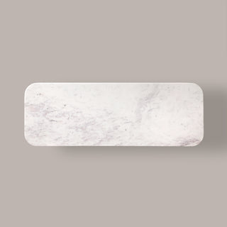 Natural marble top of the Kelby tallboy from above