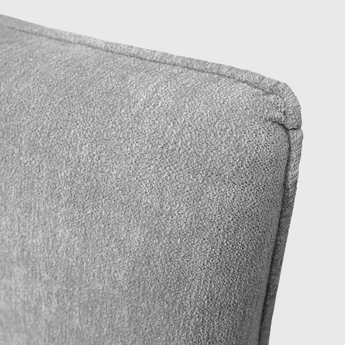 Haze Bed close-up of headboard corner with piped edge