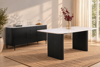 Kelby black buffet and Kelby dining table styled together in a dining room