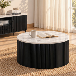 Kelby round coffee table with natural marble top and black reeded drum