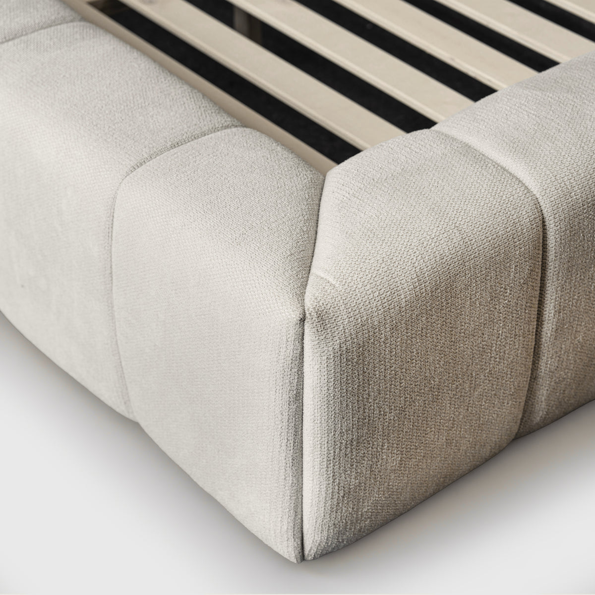 Marshmallow Cloud Bed close-up of padded corner and timber slats