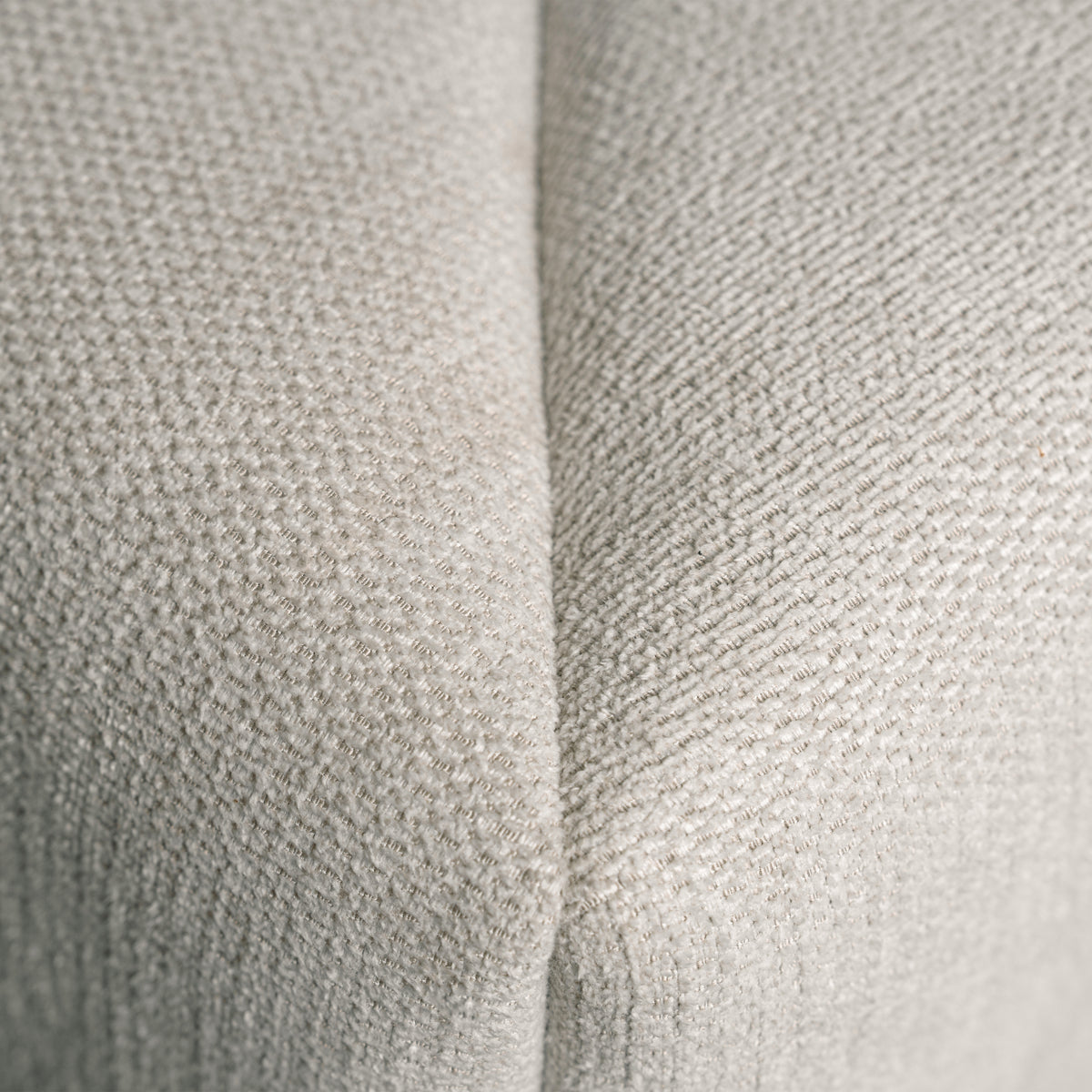 Marshmallow Cloud Bed close-up of textured ivory upholstery fabric